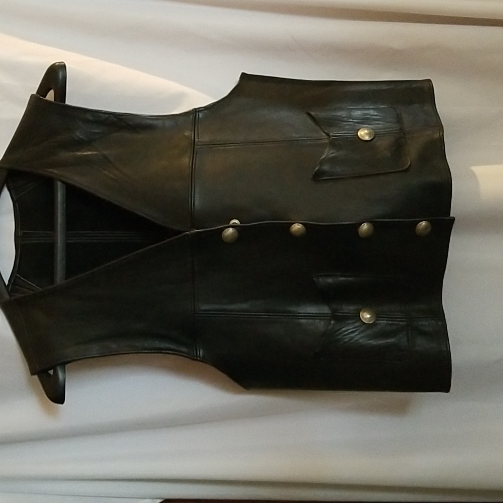 Vintage Black leather motor cycle  vest.  Buffalo nickle  snaps. Size  36